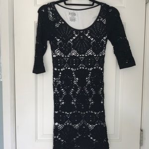 3/4 sleeve stretch knit dress with nude lining.